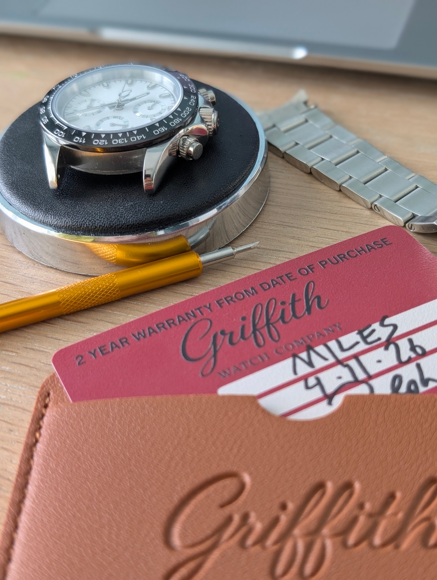 Griffith two-year warranty card and leather pouch